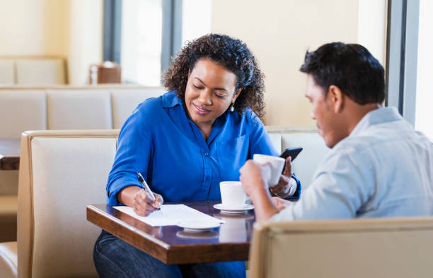 istock Business people meeting in restaurant 1270694719