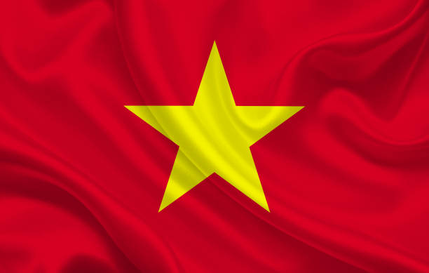 istock Flag of Vietnam country on wavy silk fabric background panorama 1270702463