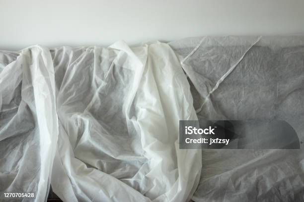 Sofa Covered With White Cloth In Homedecoration Stock Photo - Download Image Now - Apartment, Black And White, Chair