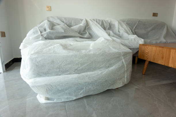 istock sofa covered with white cloth in homedecoration 1270705433