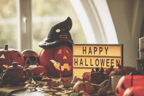 istock Low angle view of Halloween setting against window in daylight 1270707216