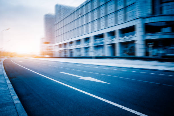 istock city empty traffic road with cityscape in background 1270709682