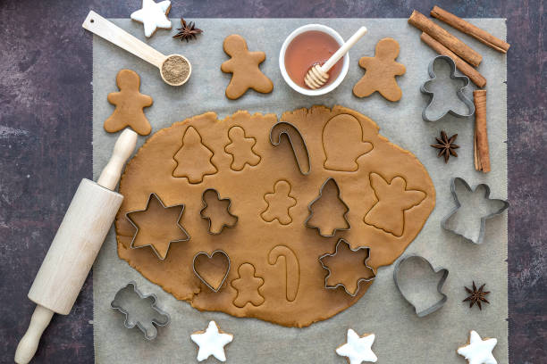 istock Top view on rolled out dough for Christmas gingerbread cookies 1270710417