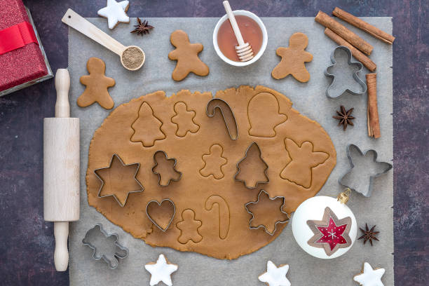 istock Top view on rolled out dough for Christmas gingerbread cookies 1270710419