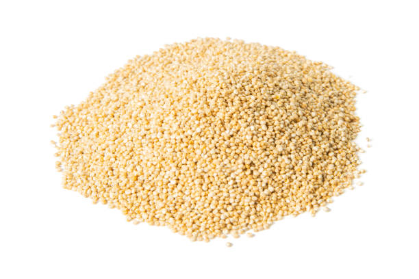 istock Heap of raw, uncooked quinoa seed isolated on white background. Front views, close-up 1270710553