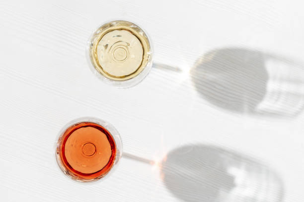 istock Rose and white wine in glass, top view 1270720528