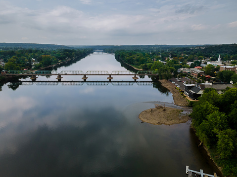 The view of aerial Delaware river, bridge across the in the historic city New Hope Pennsylvania and Lambertville New Jersey US