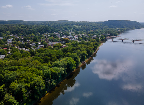 Aerial overhead of Delaware river landscape, American town of Lambertville New Jersey, view near small town historic New Hope Pennsylvania US