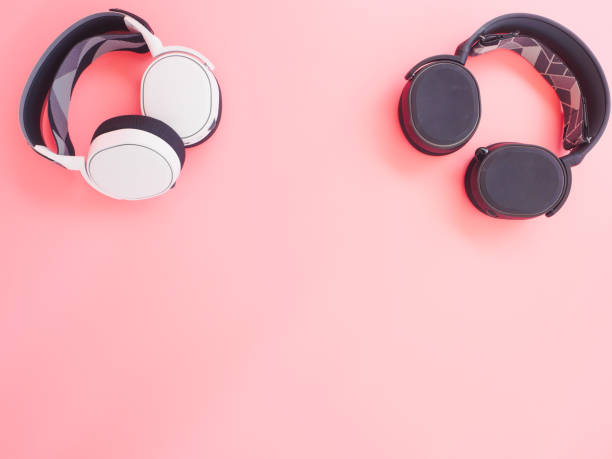 istock music headphones on pink background. 1270734375