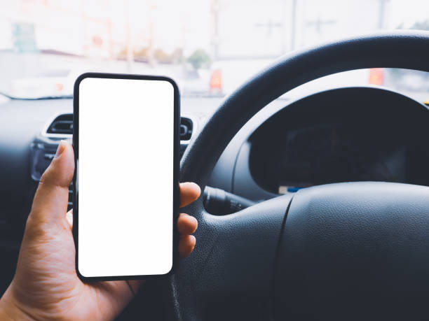 istock Close up blank empty screen smartphone on holder in car use for Navigation or GPS. Car interior view. 1270734388
