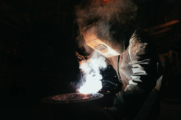 istock Industrial Worker at the factory welding closeup 1270735085