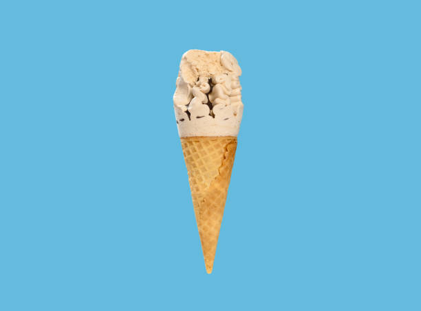 istock milk tea flavor ice cream cone with a bite on a blue background horizontal composition 1270736019