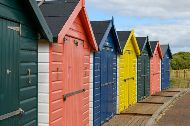 istock Colorful Beach huts in a row 1270736040