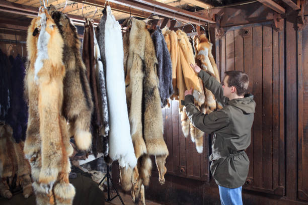 istock A young man hangs up the fur after treatment 1270737571