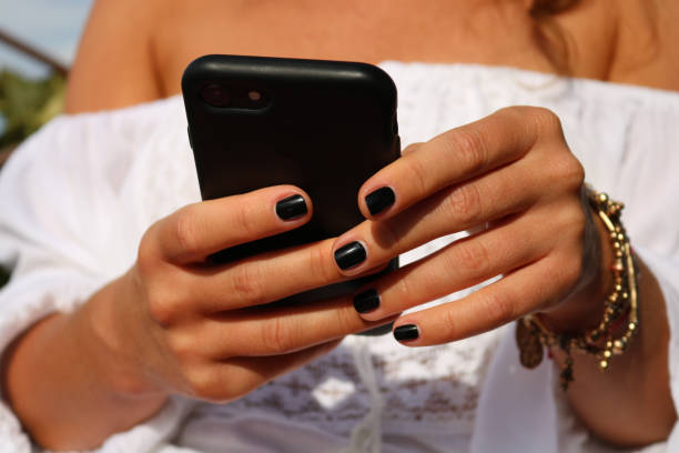 istock Young woman hands using phone 1270738450