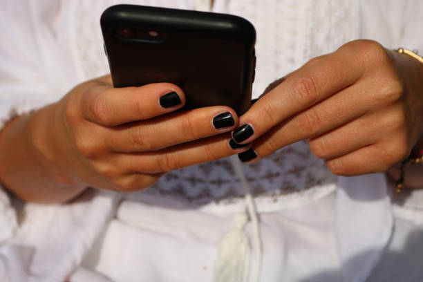 istock Young woman hands using phone 1270738489