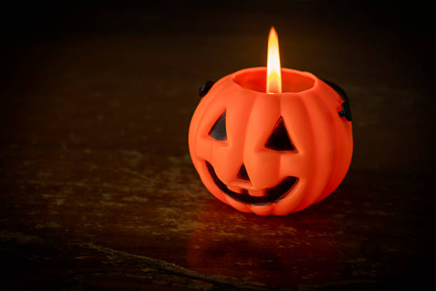 istock lighted candle in the form of a Jack 1270739306