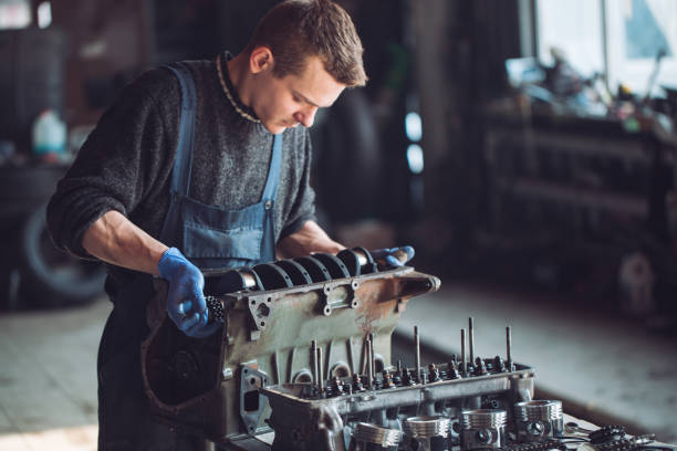 Master collects a rebuilt motor for the car