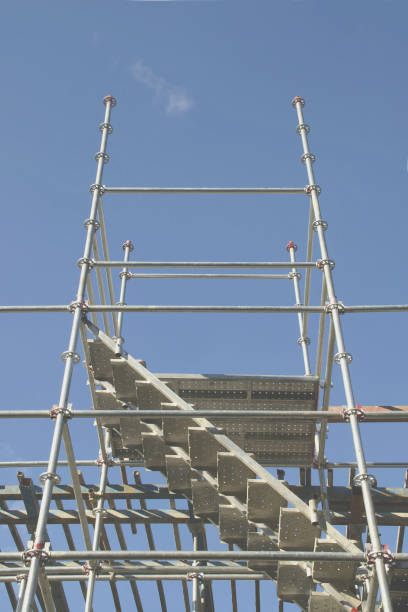 istock Aluminum Scaffolding & Ladder at a Construction Site against Blue Sky 1270741961