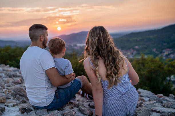 istock Family watching the sunset 1270743008