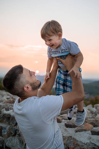 istock Father and his little son looking and smiling at each other 1270743743
