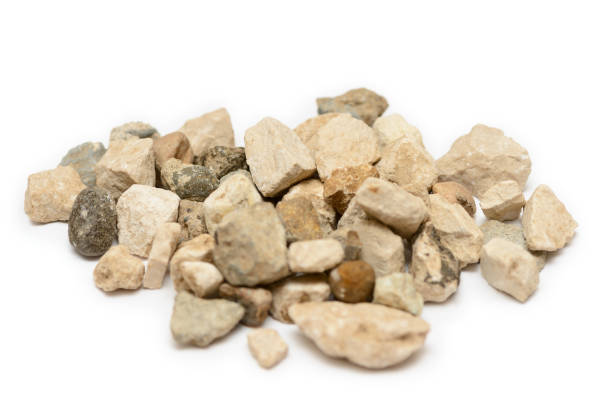 istock A bunch of different stones with shadows on a white background 1270749790