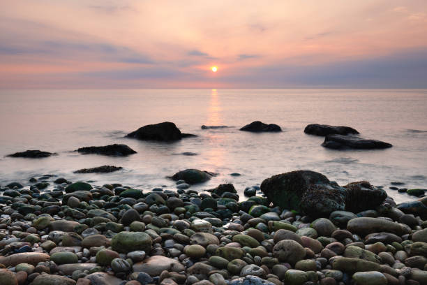 istock Rocky beach at sunrise 1270751967