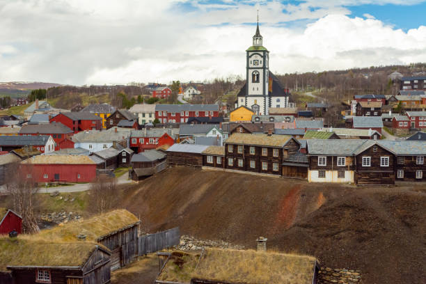 View on the mining village of Roros in Norway with church in the center View on the mining village of Roros in Norway. Historical village. roros mining city stock pictures, royalty-free photos & images