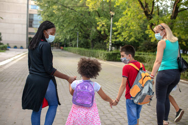 istock Parents with elementary school students during virus pandemic 1270757297