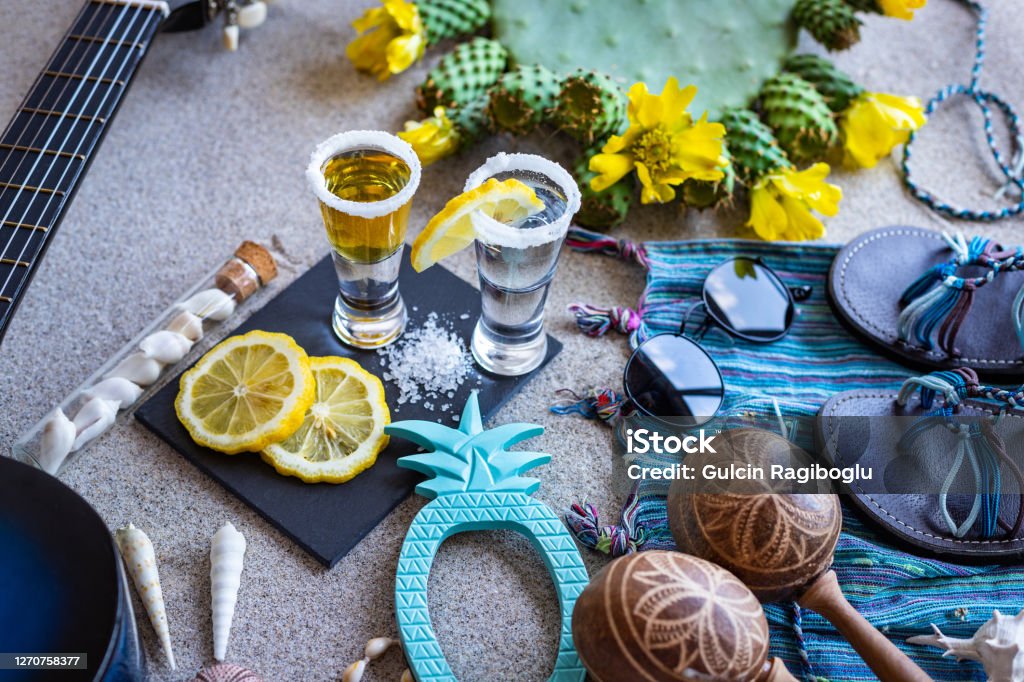Tequila shot at the beach . Vacations concept with drinks. Beach Stock Photo