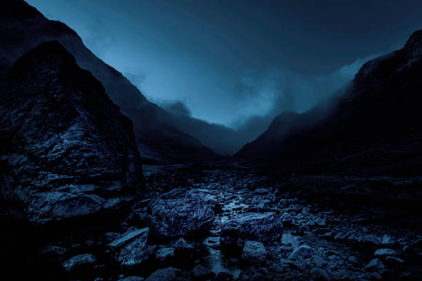 Honister pass in Lake District, Cumbria,UK Honister pass in Lake District, Cumbria,UK.Foggy mountain pass.Dark and dramatic landscape image with atmospheric mood.Bad weather in the mountains. valley stock pictures, royalty-free photos & images