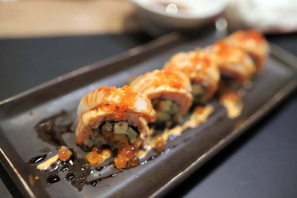 istock c Topped with orange flying fish roe In a square plate In a japanese restaurant. Selective focus. 1270762885
