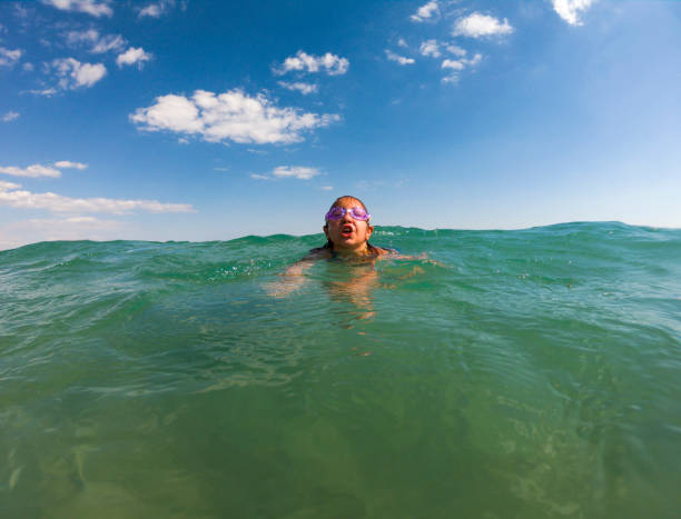 istock Little Girl in The Sea 1270763849
