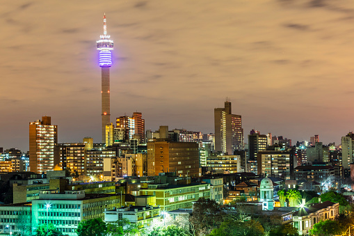 Johannesburg inner cityscape with the communication tower and ponte flats, at sunset dusk, Johannesburg is also known as Jozi, Jo'burg or eGoli, is the largest city in South Africa.