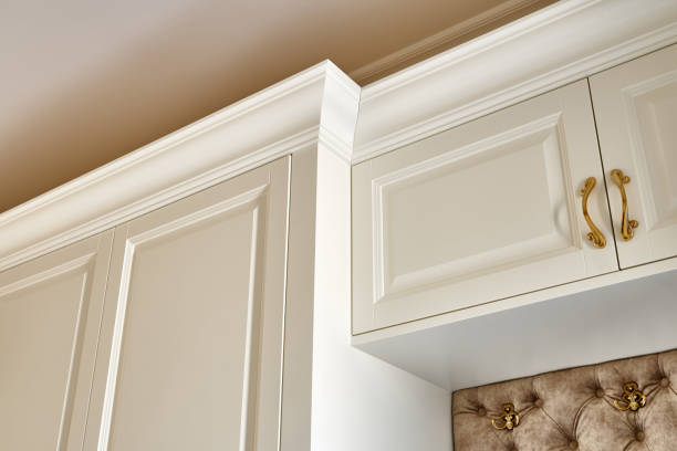istock Classic white wardrobe with seating in contemporary bright hallway. Carriage coupler closet bench 1270766517
