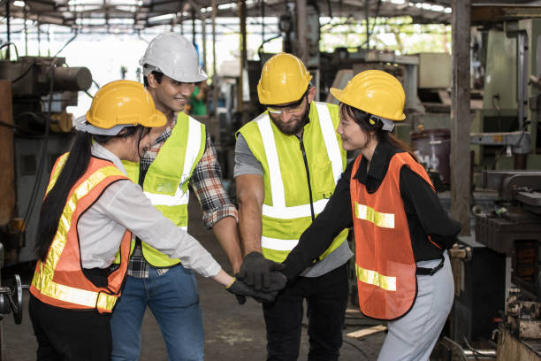 istock Factory workers are showing teamwork in the warehouse. 1270767914