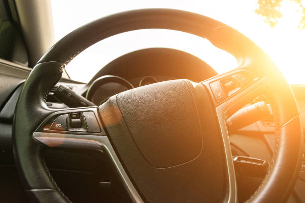 Travel trip car. Happy young man inside vehicle driving in sunny day. Fun driver ride in summer vacation concept. Travel trip car. Happy young man inside vehicle driving in sunny day. Fun driver ride in summer vacation concept undivided highway stock pictures, royalty-free photos & images