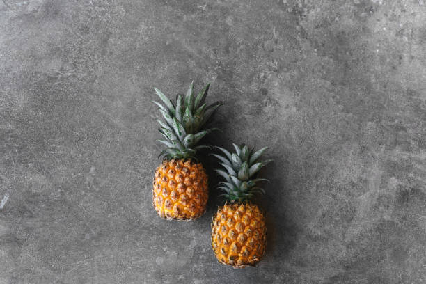 istock Pineapple on a stone table. Tropical Fruits. 1270772991
