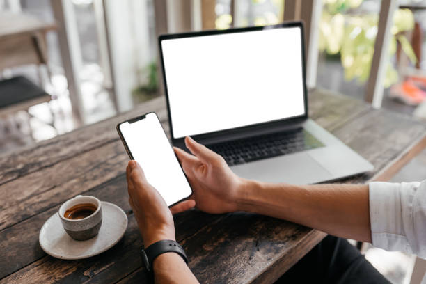 istock Cropped view of man with laptop computer copy space for your text or promotional content, mobile phone 1270772997