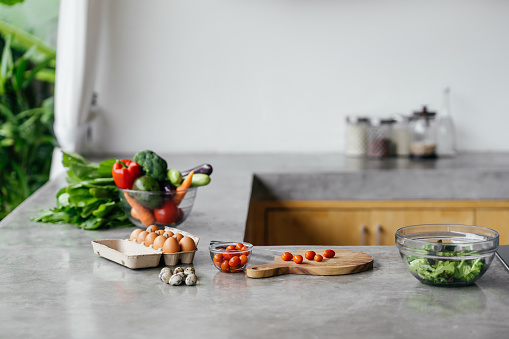 healthy foods are on the table in the open kitchen