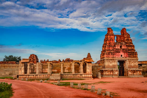 istock vithala temple ancient stone art entrance gate with amazing blue sky 1270774104