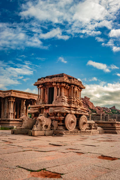 hampi stone chariot the antique stone art piece from unique angle with amazing sky hampi stone chariot the antique stone art piece from unique angle with amazing blue sky image is taken at hampi karnataka india. it is the most impressive and truly splendid architecture in hampi. karnataka stock pictures, royalty-free photos & images