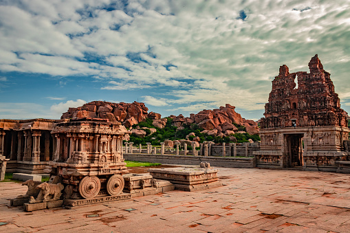 vithala temple hampi ruins antique stone art from a unique angle image is taken at hampi karnataka india. The most impressive structure in Hampi, it is a truly splendid example of rich architecture.