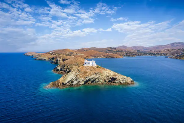 Aerial view of the lighthouse entering the port of Tzia, Kea island, Cyclades, Greece