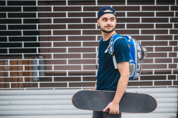 istock Portrait of man with skateboard 1270779834
