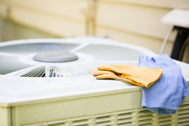 istock Air conditioner service call by skilled technician. 1270781698