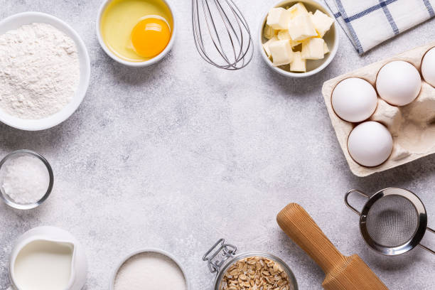 istock Ingredients for baking - flour, milk, salt, sugar, eggs. 1270782756