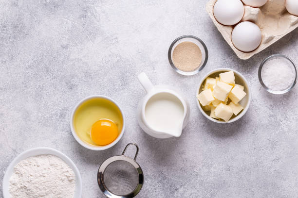 istock Ingredients for baking - flour, milk, salt, sugar, eggs. 1270783610
