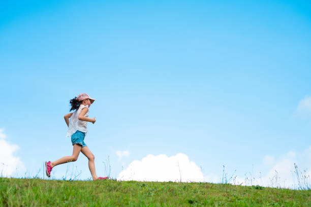 istock Child running in the meadow 1270783839