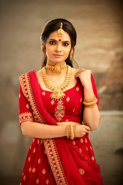 Pretty Indian young Hindu Bride in studio shot. Pretty Indian young Hindu girl dress up for festival. south indian lady stock pictures, royalty-free photos & images